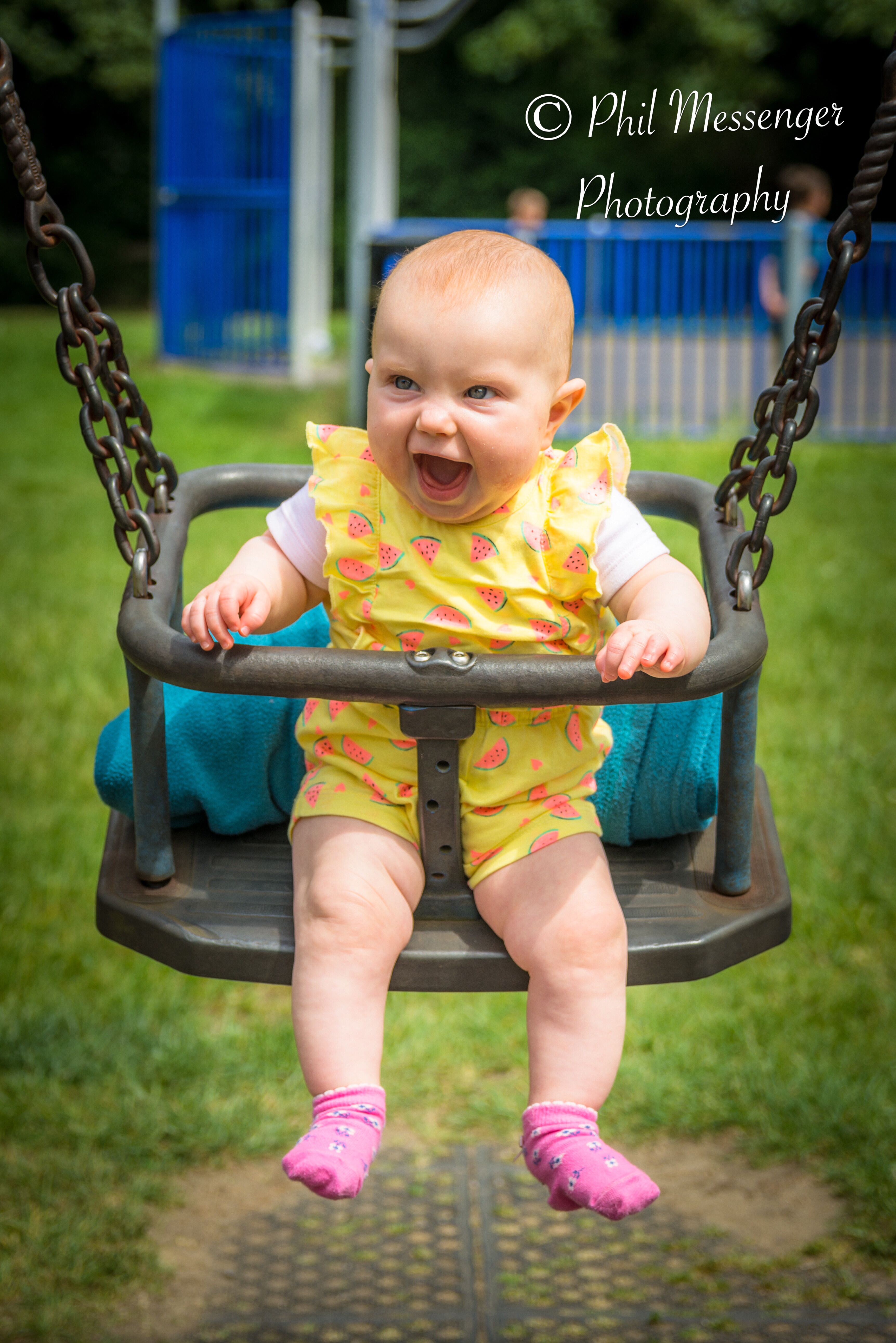 Baby first time on a swing.