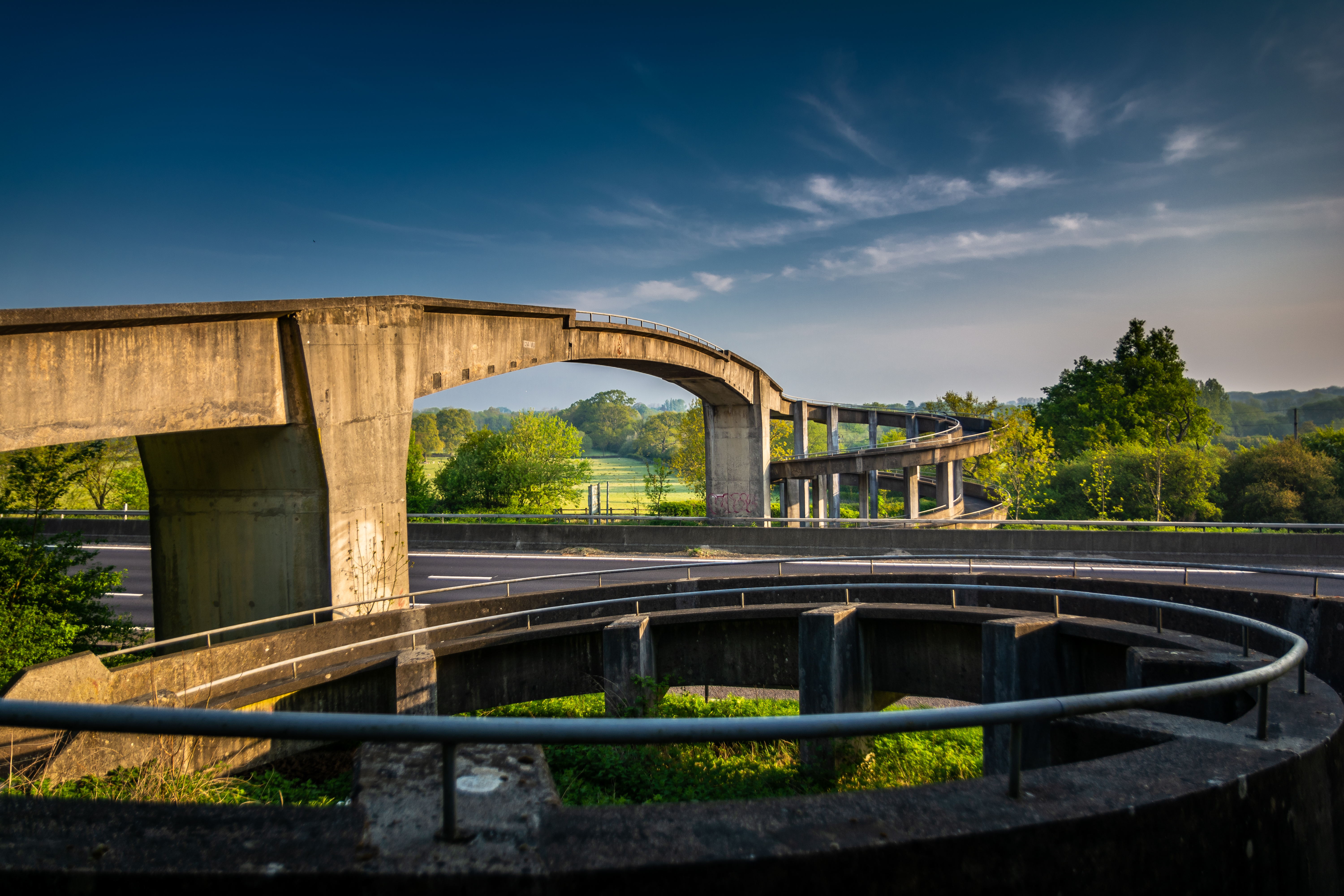 helter skelter bridge spanning the M4 at Coate in early morning sunlight.
