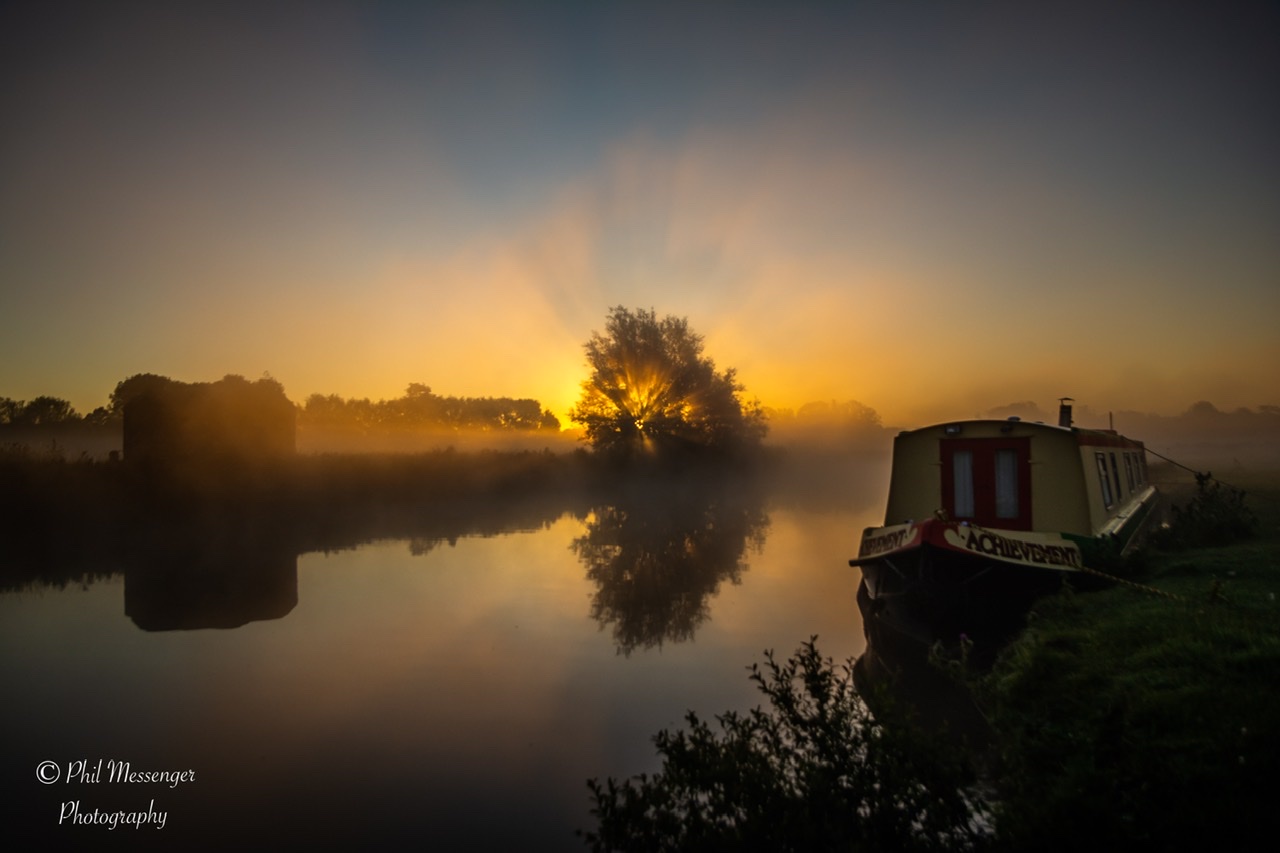 A misty sunrise on the river Thames at Lechlade, Gloucestershire.