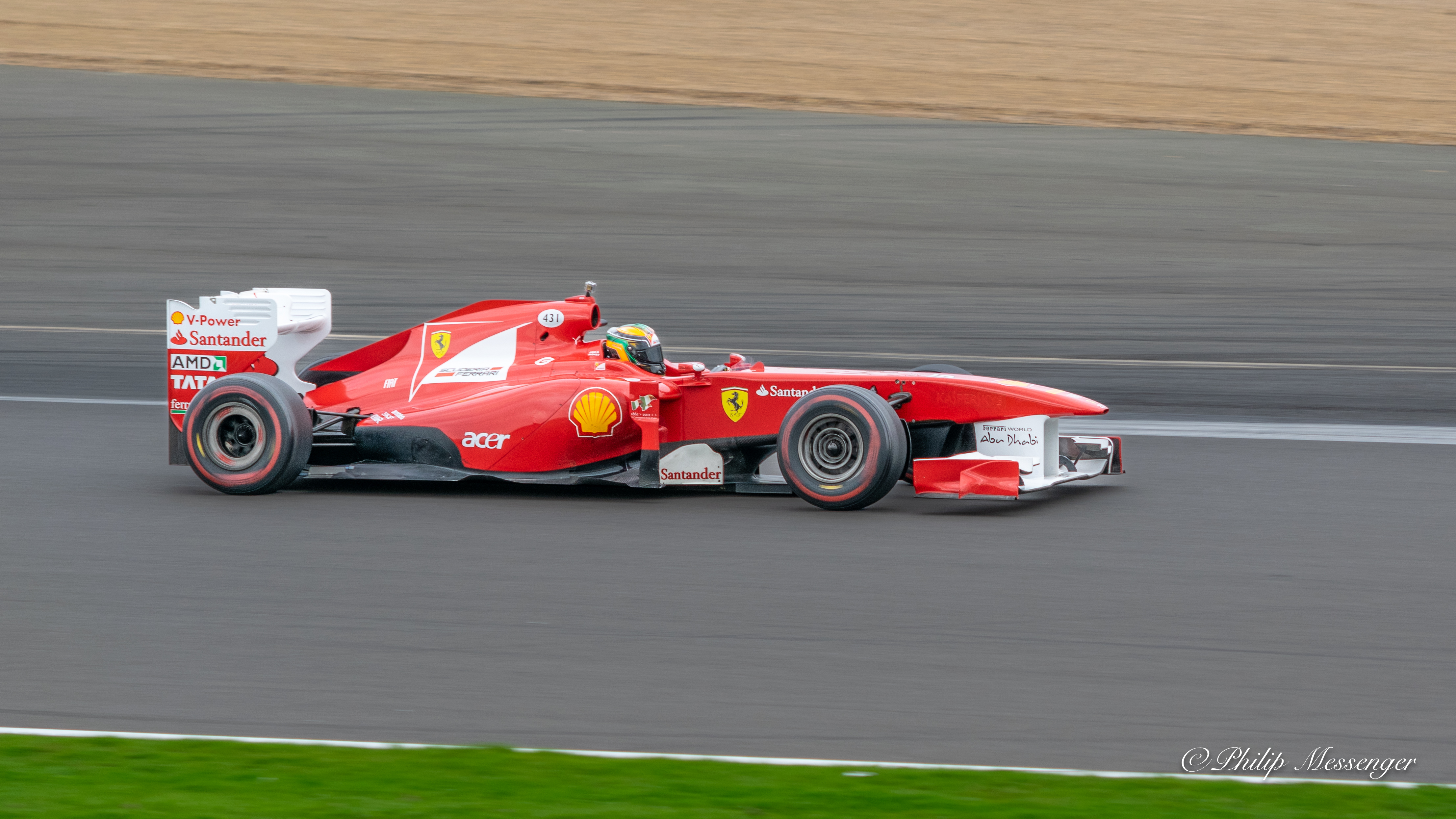 2011 Ferrari F150 Formula one car flying laps at Silverstone 